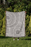 Ray Abstract Print Cotton Throw Blanket in Gray, outdoors