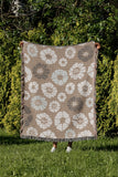 Valu Floral Cotton Throw Blanket in Beige, outdoors