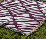 Pyro Abstract Print Cotton Throw Blanket in Purple, outdoors