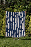 Deka Abstract Cotton Throw Blanket in Blue, outdoors