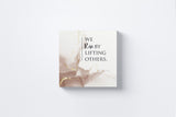 We Rise by Lifting Others Canvas Wall Art in Nude, square