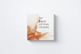 We Rise by Lifting Others Canvas Wall Art in Orange, square