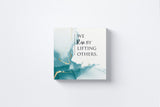 We Rise by Lifting Others Canvas Wall Art in Turquoise, square