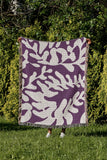 Booker Floral Cotton Throw Blanket in Purple, outdoors