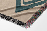 Addai Abstract Triangle Pattern Blanket Throw in Teal and Beige, side view