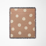 Akon Hand Woven Throw Blanket in Rust and Beige, laid flat