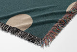 Akon Hand Woven Throw Blanket in Teal and Beige, side view