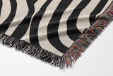 Alaka Circles Cotton Throw Blanket in Black and Beige, side view