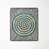 Alaka Circles Cotton Throw Blanket in Teal and Beige, laid flat