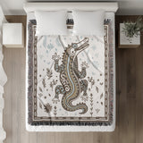Amiro Crocodile Cotton Blend Blanket Throw in Beige and Off-White, on a bed