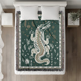 Amiro Crocodile Cotton Blend Blanket Throw in Emerald and Off-White, on a bed
