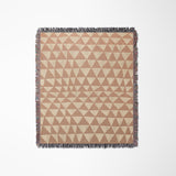 Asaba Abstract Cotton Throw Blanket in Rust and Beige, laid flat