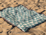 Asaba Abstract Cotton Throw Blanket in Sky Blue and Beige, outdoors