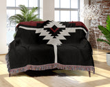 Asko Southwestern Cotton Blend Blanket Throw in Red, Black and Off-White, draped over a chair