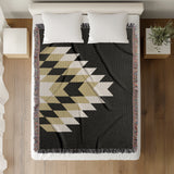Bimisii Southwestern Cotton Blend Blanket Throw in Black, Off-White and Dull Gold, on a bed