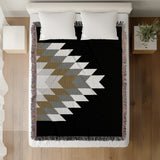 Bimisii Southwestern Cotton Blend Blanket Throw in Gray, Brown and Off-White, on a bed
