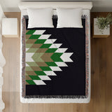 Bimisii Southwestern Cotton Blend Blanket Throw in Green, Brown and Off-White, on a bed