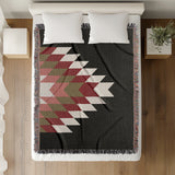 Bimisii Southwestern Cotton Blend Blanket Throw in Red, Brown, Black and Off-White, on a bed