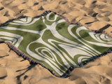 Binitie Zebra Print Cotton Throw Blanket in Olive Green and Beige, outdoors