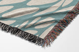 Buga Abstract Print Cotton Throw Blanket in Sky Blue and Beige, side view
