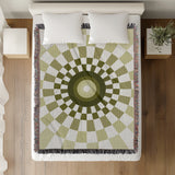 Bullseye Abstract Cotton Blend Blanket Throw in Chartreuse and Off-White, on a bed