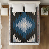 Caca Southwestern Cotton Blend Blanket Throw in Blue, Black and Off-White, on a bed