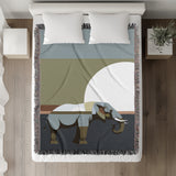 Carney Elephant Cotton Blend Blanket Throw in Blue, Gray and Chartreuse, on a bed