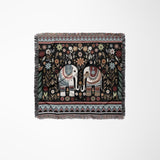 Cece Elephant Cotton Blend Blanket Throw in Black, Beige, Blue and Red, laid flat