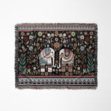 Cece Elephant Cotton Blend Blanket Throw in Black, Beige, Blue and Red, laid flat