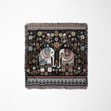 Cece Elephant Cotton Blend Blanket Throw in Black, Beige, Blue and Red, laid flat