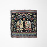 Cece Elephant Cotton Blend Blanket Throw in Black, Green and Yellow, laid flat