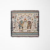 Cece Elephant Cotton Blend Blanket Throw in Beige, Blue and Off-White, laid flat