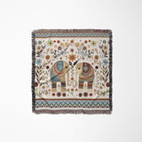 Cece Elephant Cotton Blend Blanket Throw in Beige, Blue and Off-White, laid flat