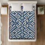 Chitto Southwestern Cotton Blend Blanket Throw in Blue and Off-White, on a bed