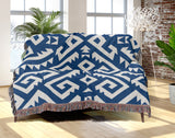 Chitto Southwestern Cotton Blend Blanket Throw in Blue and Off-White, draped over a chair