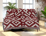 Chitto Southwestern Cotton Blend Blanket Throw in Red and Off-White, draped over a chair