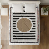Circle Abstract Cotton Blend Blanket Throw in Beige, Black and Off-White, on a bed