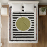 Circle Abstract Cotton Blend Blanket Throw in Black, Chartreuse and Off-White, on a bed