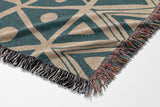 Cocodili Abstract Print Cotton Throw Blanket in Teal and Beige, side view