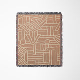 Diof Abstract Print Cotton Throw Blanket in Beige and Rust, laid flat