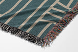 Diof Abstract Print Cotton Throw Blanket in Teal and Beige, side view