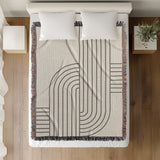 Eko Cotton Blend Blanket Throw in Gray, on a bed