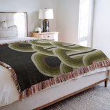 Farni Cotton Blend Blanket Throw in Chartreuse, on a bed