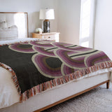 Farni Cotton Blend Blanket Throw in Purple, on a bed