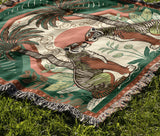 Faya Tiger Cotton Blend Blanket Throw in Green and Orange, on a bed