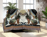 Faya Tiger Cotton Blend Blanket Throw in Black and Brown, draped over a chair