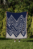 Addai Abstract Triangle Pattern Blanket Throw in Navy Blue, outdoors