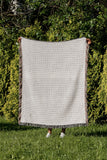 Addy Floral Cotton Throw Blanket in Purple, outdoors