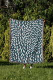 Addy Floral Cotton Throw Blanket in Teal, outdoors
