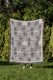 Anala Abstract Cotton Throw Blanket in Gray, outdoors